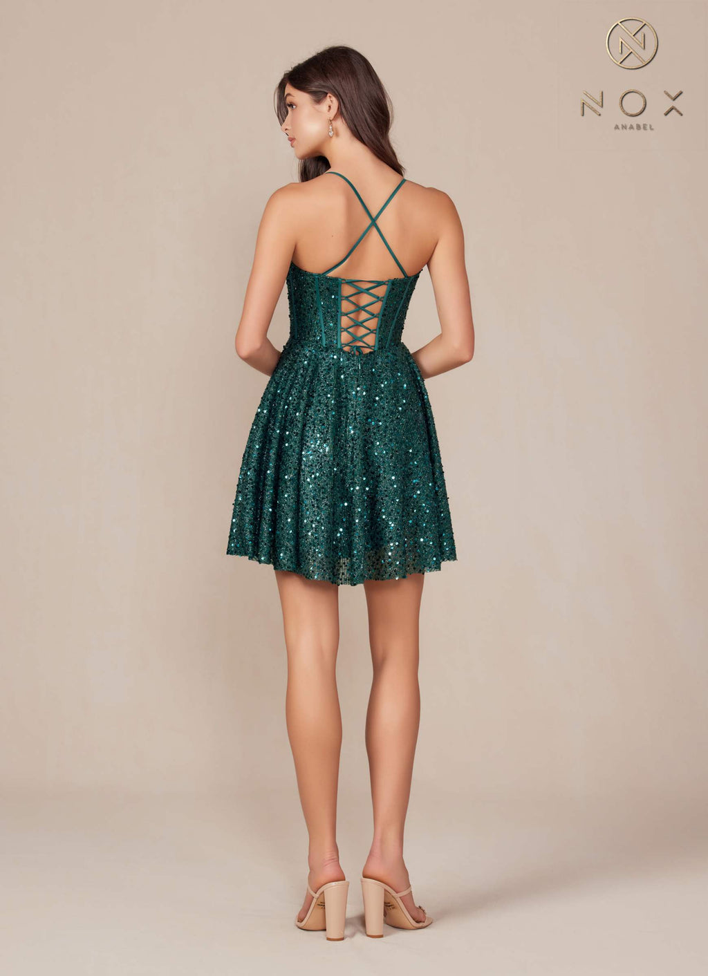 Emerald green sequin A-line mini dress, crisscross open back with thin spaghetti straps