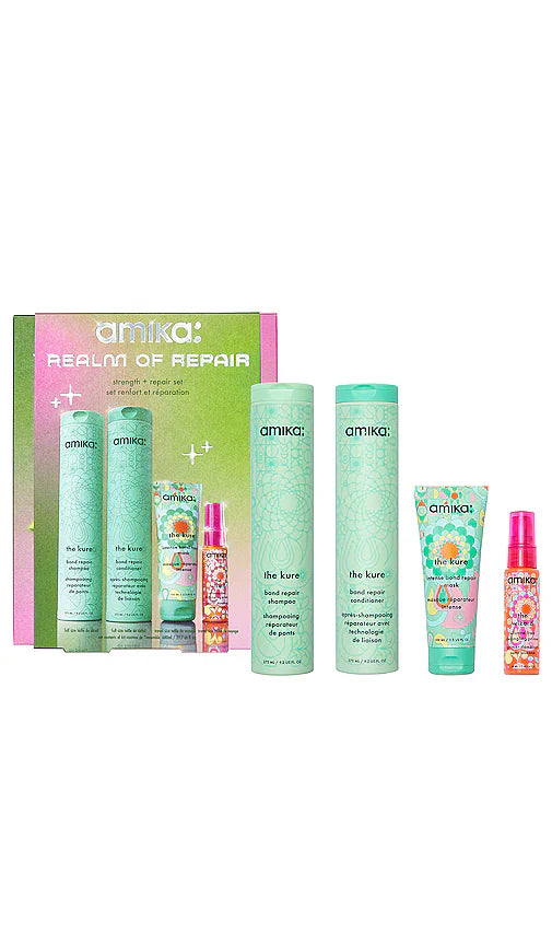 Amika Realm of Repair hair kit with mint bottles and small treatment tube