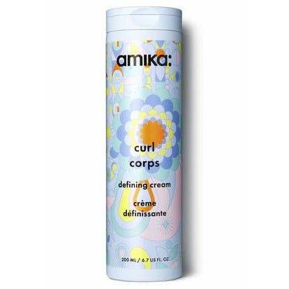 amika Curl Corps defining cream bottle, cylindrical with blue label