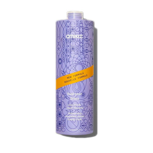 Amika shampoo bottle, purple with floral graphics and yellow stripe