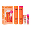 Amika Soft Strand Stars 4-piece hair wash and care set with orange and pink bottles