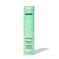 Strength repair shampoo bottle with green floral label and flip-top cap