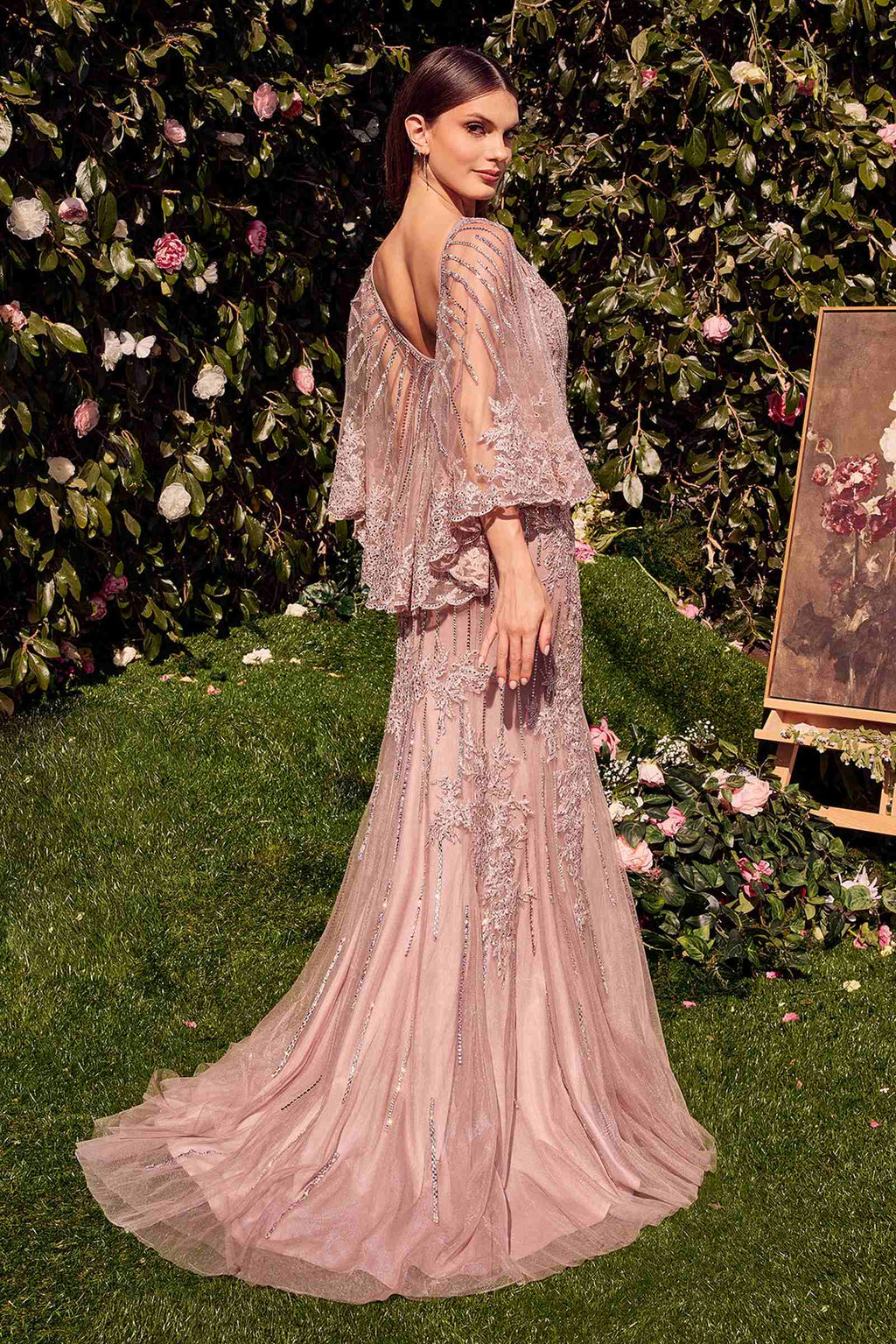 Dusty rose lace fitted dress with draped sheer caplet sleeves and long flared skirt