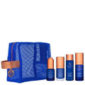 Augustinus Bader starter kit with blue mesh pouch and four skincare bottles