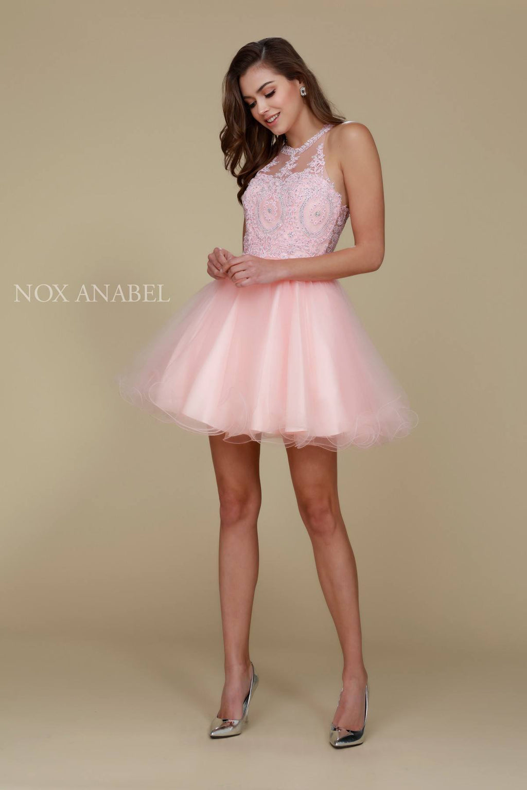 Blush short halter A-line tulle dress with ornate lace top and flared tulle skirt