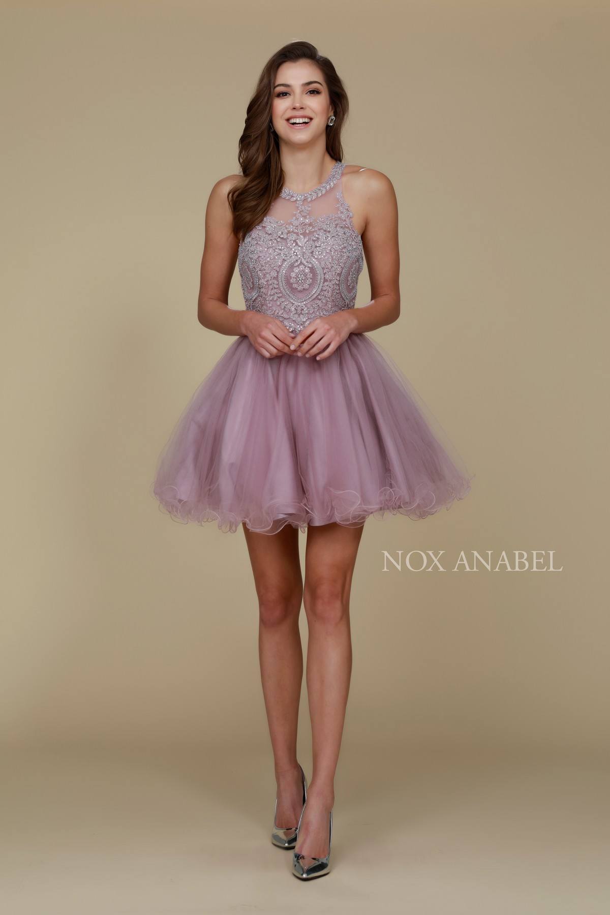 Mauve sleeveless short dress with embellished bodice and layered tulle skirt.