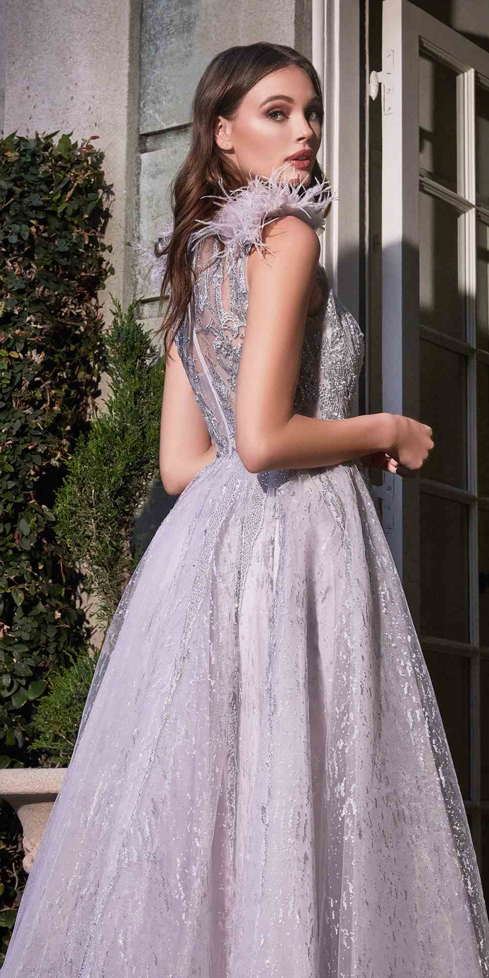 Silver-toned feather-shoulder tulle A-line ball gown, side profile
