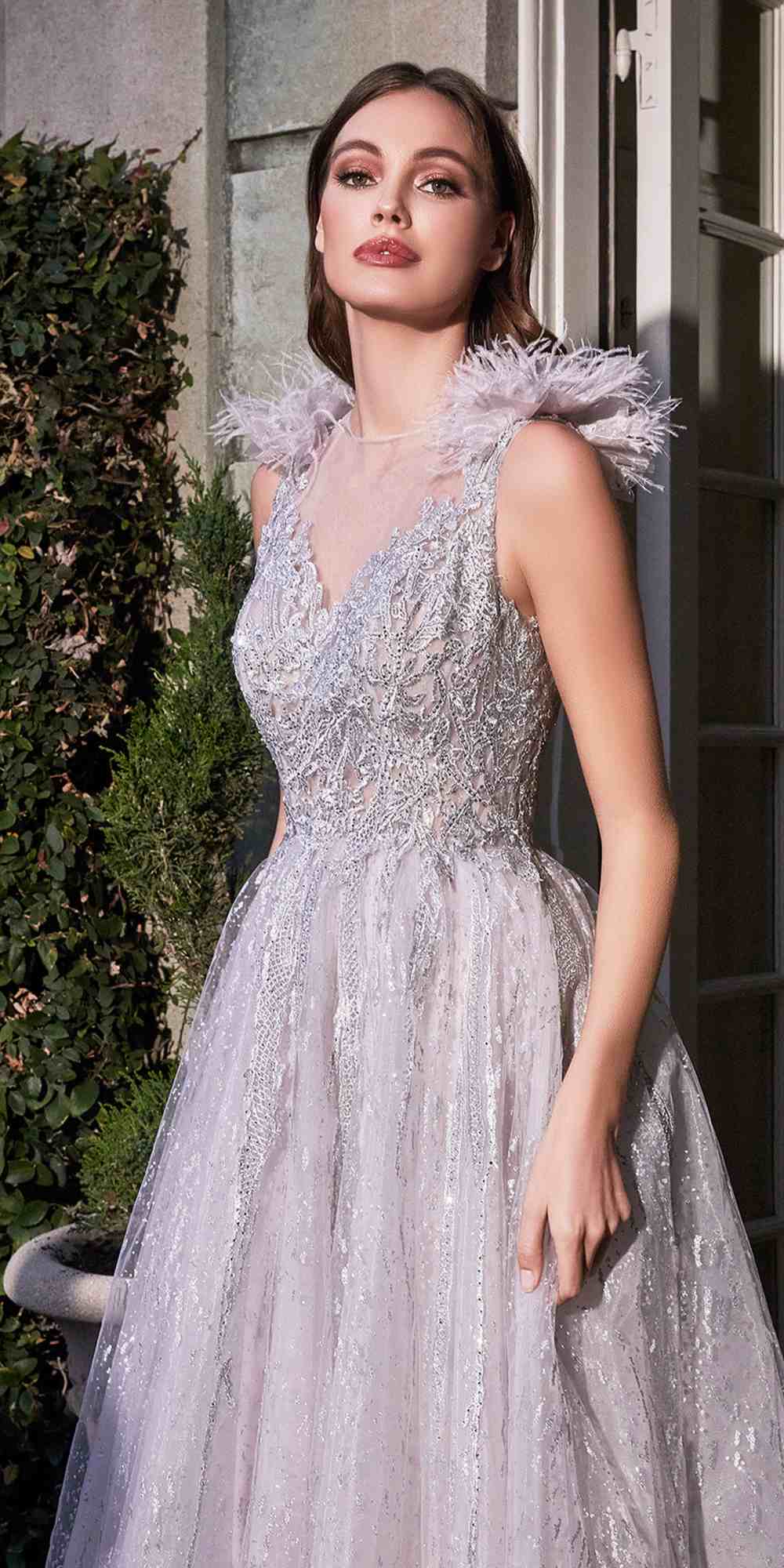 Silver-toned feathered shoulder tulle ball gown with sequined V-neck bodice, front view