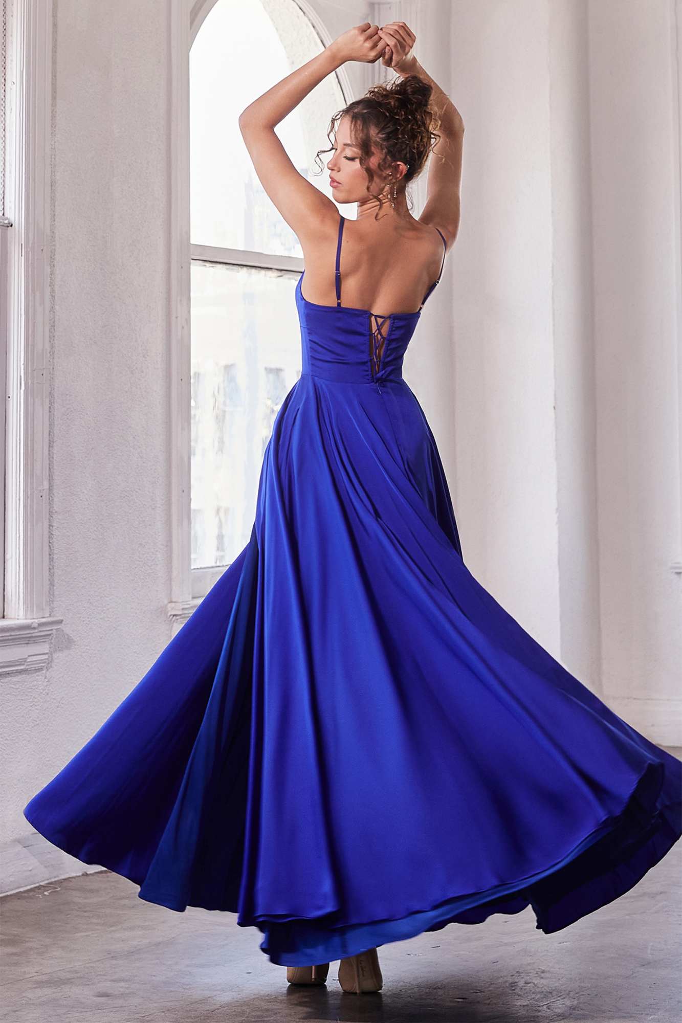 Satin A-line gown with square neck, spaghetti straps, and side slit, royal blue