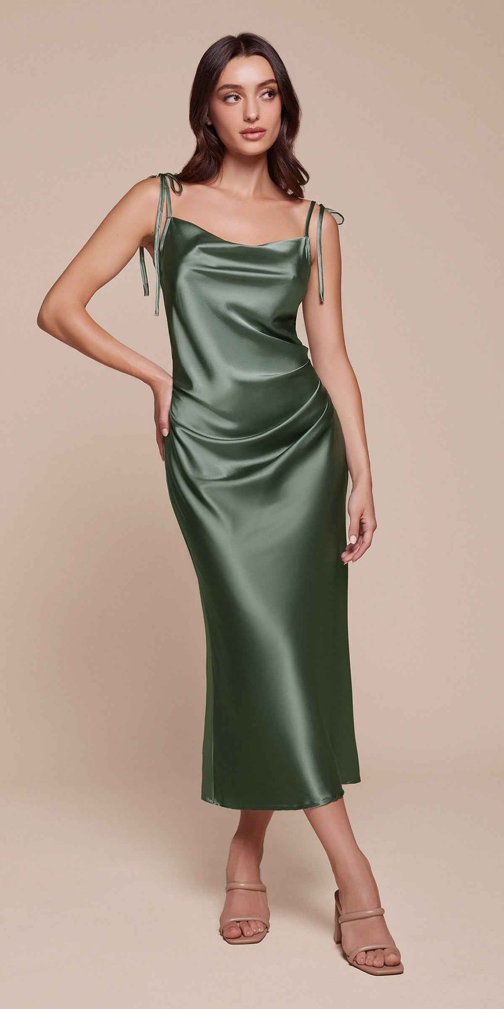 Dark green satin midi slip dress with spaghetti straps and cowl neckline