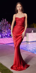 Red satin slip gown with spaghetti straps, fitted mermaid silhouette.