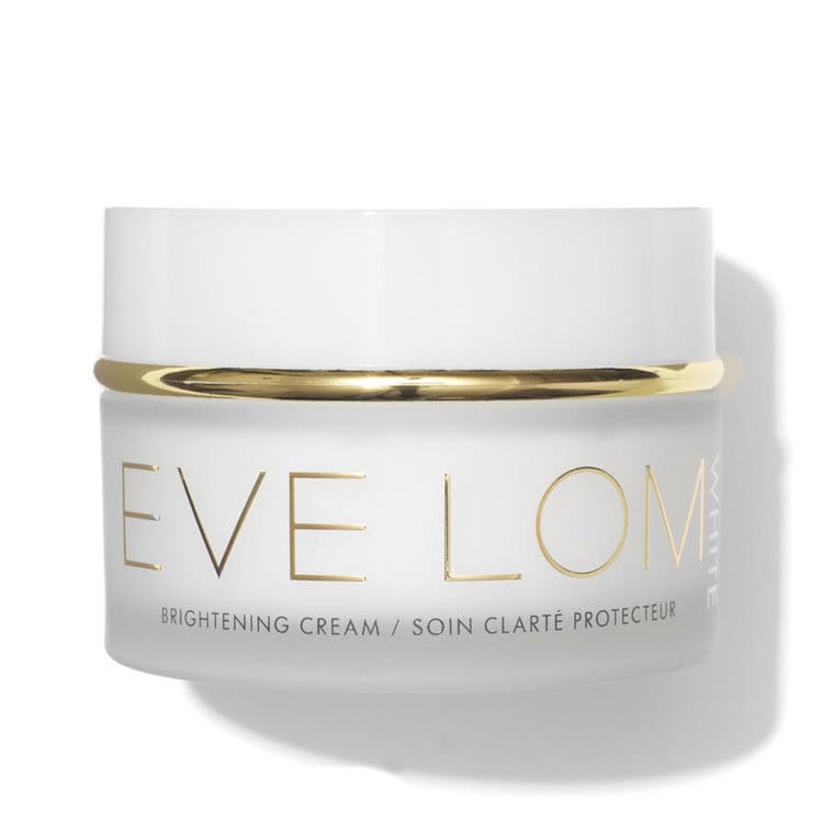 eve lom brightening cream jar with gold lid and frosted white container