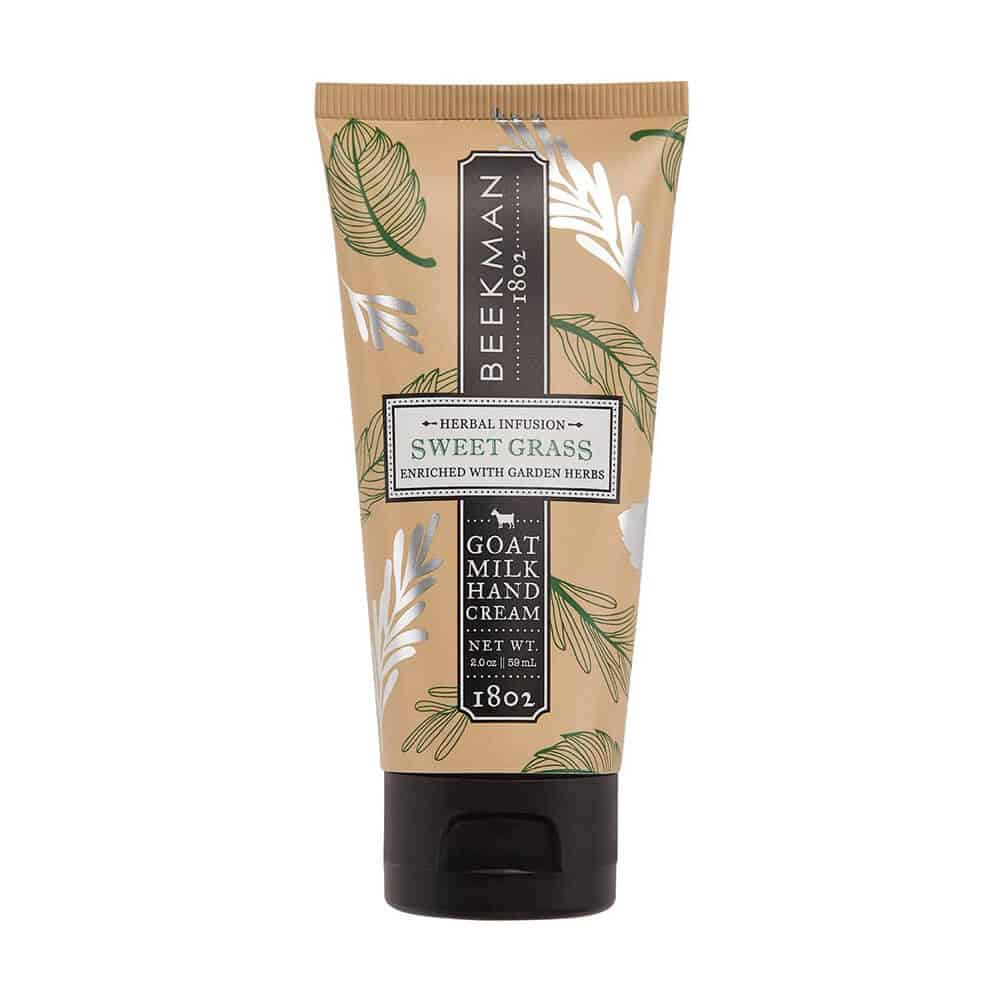 Beekman 1802 Sweet Grass hand cream tube, 2 oz; brown herbal design, black cap.