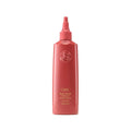 Oribe Bright Blonde hair treatment bottle with pink pump nozzle