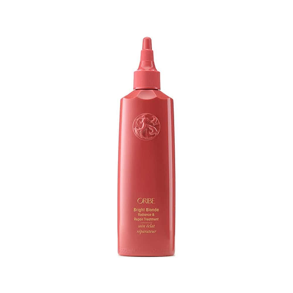 Oribe Bright Blonde hair treatment bottle with pink pump nozzle
