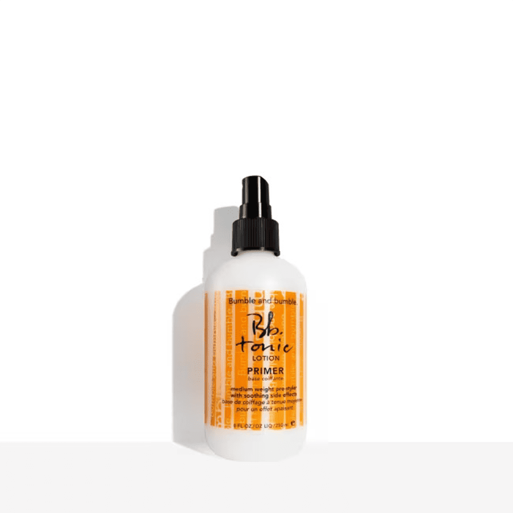 Bumble and Bumble Tonic Lotion Primer pump bottle in translucent white with black cap