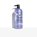 Illuminated Blonde Conditioner bottle, purple with black pump dispenser