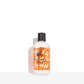 Hair styling creme bottle, white with black cap and orange label