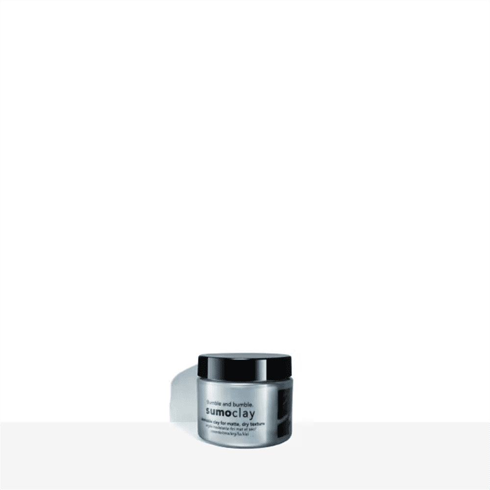 Bumble and Bumble Sumoclay hair clay jar with black lid, gray container