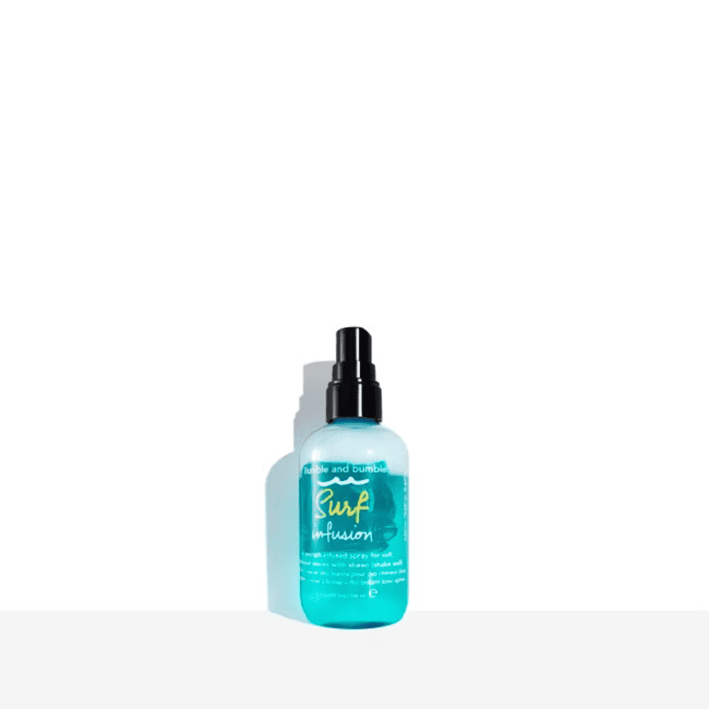 Bumble and bumble Surf Infusion hair bottle with black pump, turquoise label