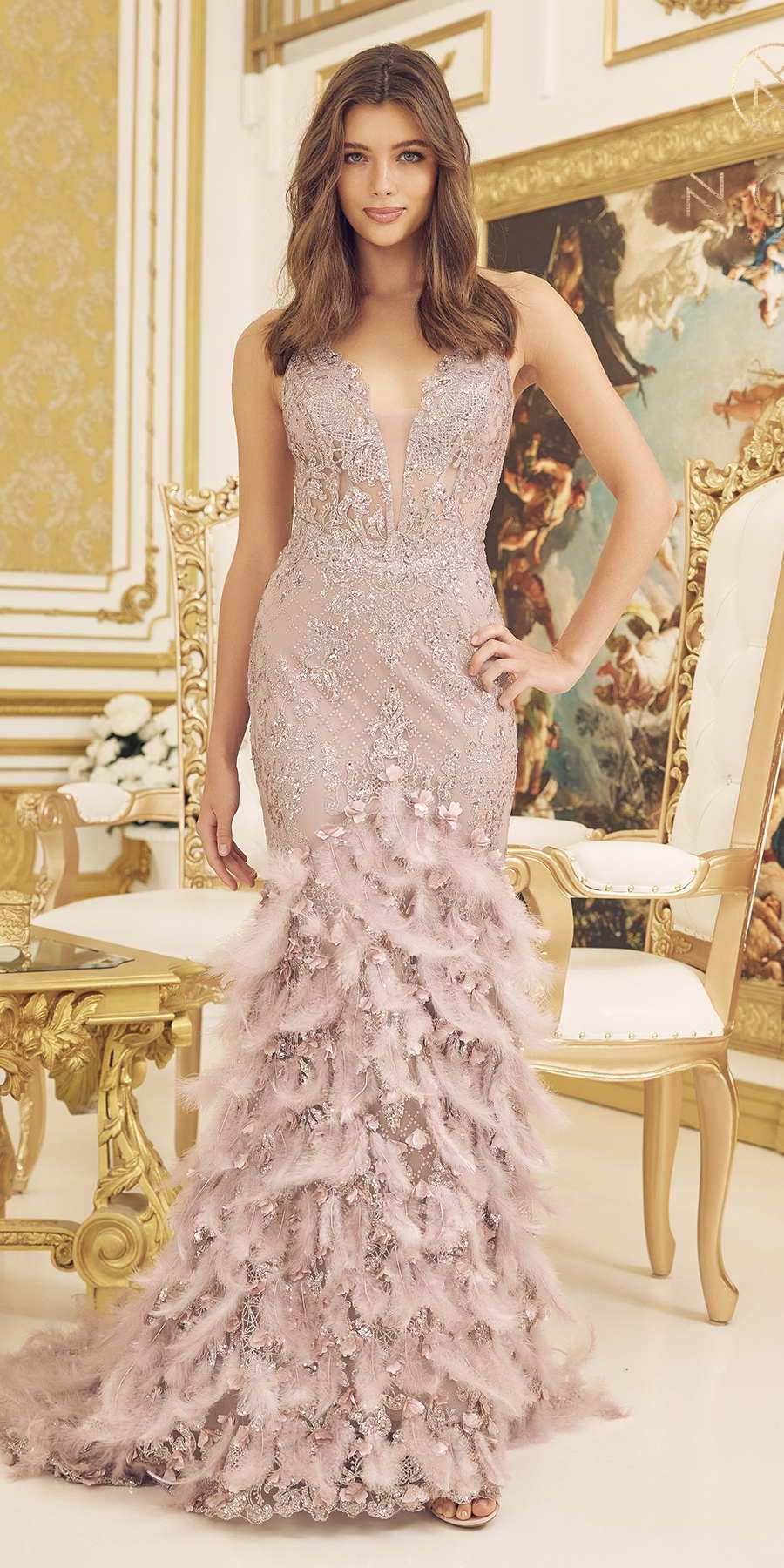Light mauve glitter mermaid gown with feather ruffle hem and V-neckline