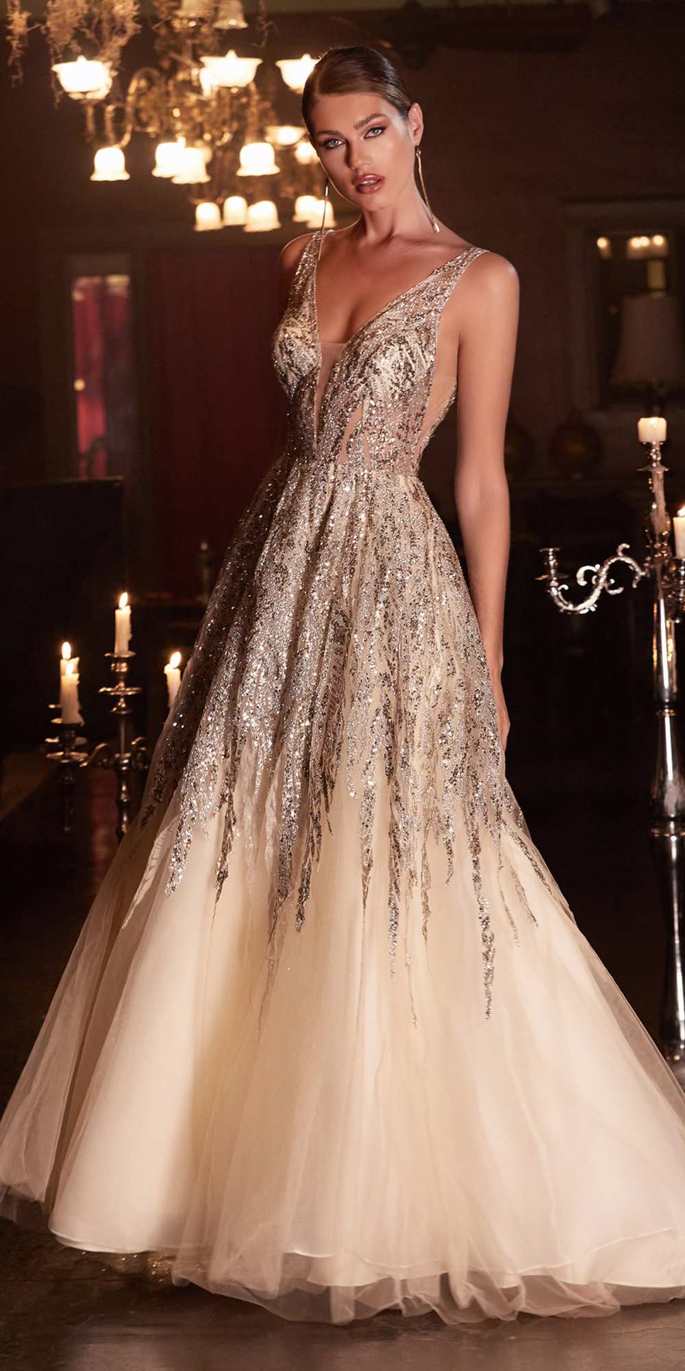 Champagne beaded shimmer ball gown with deep V-neck, sleeveless, flowing long skirt