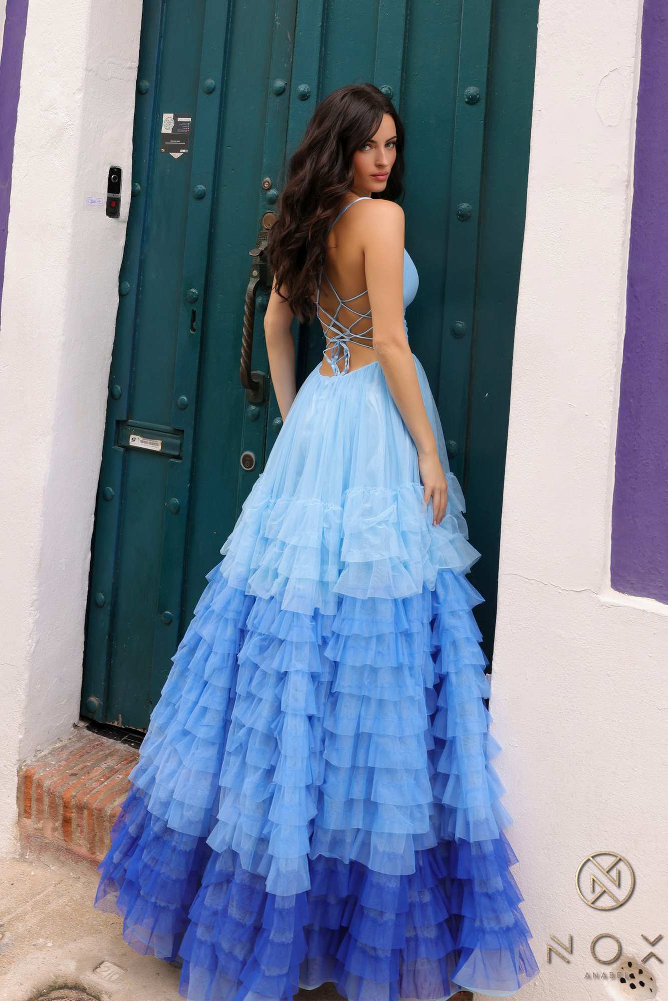 Blue ombre tiered ruffle A-line gown with spaghetti straps and V-neck, full skirt