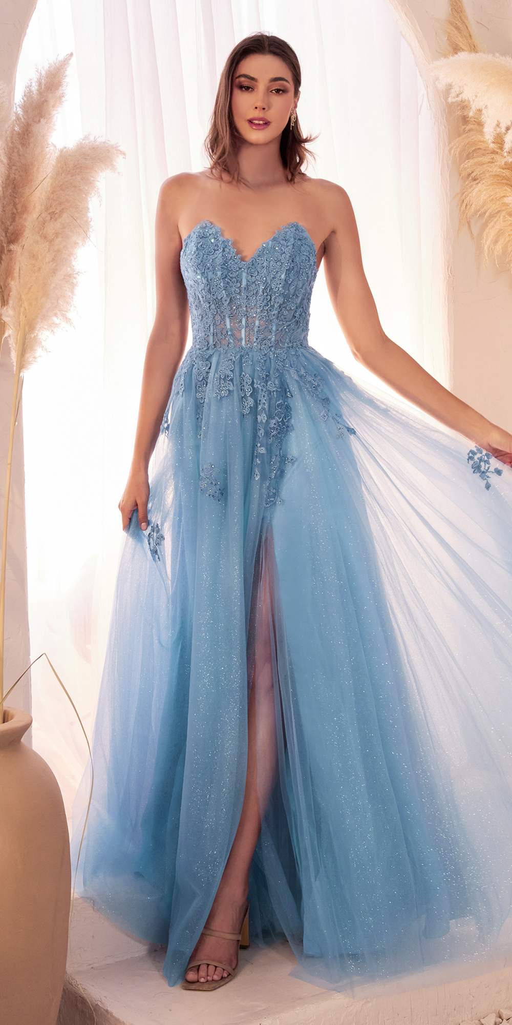 Blue strapless A-line lace and tulle ballgown with glitter detailing and long skirt