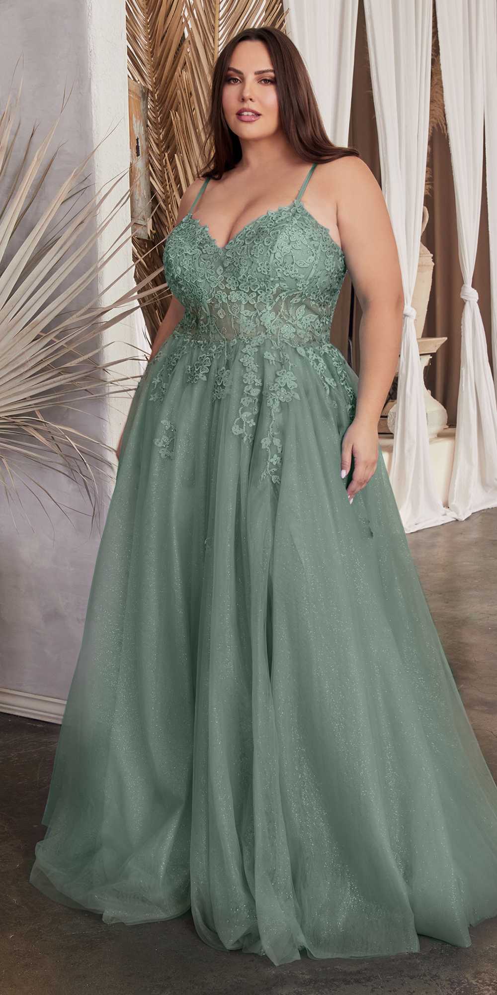Green strapless A-line ballgown with lace bodice and sheer tulle skirt with appliqués