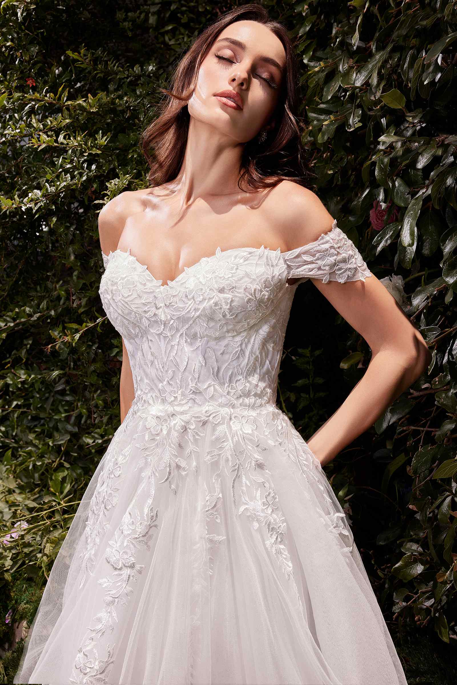 Off-shoulder lace wedding dress with textured bodice and tulle skirt, off white