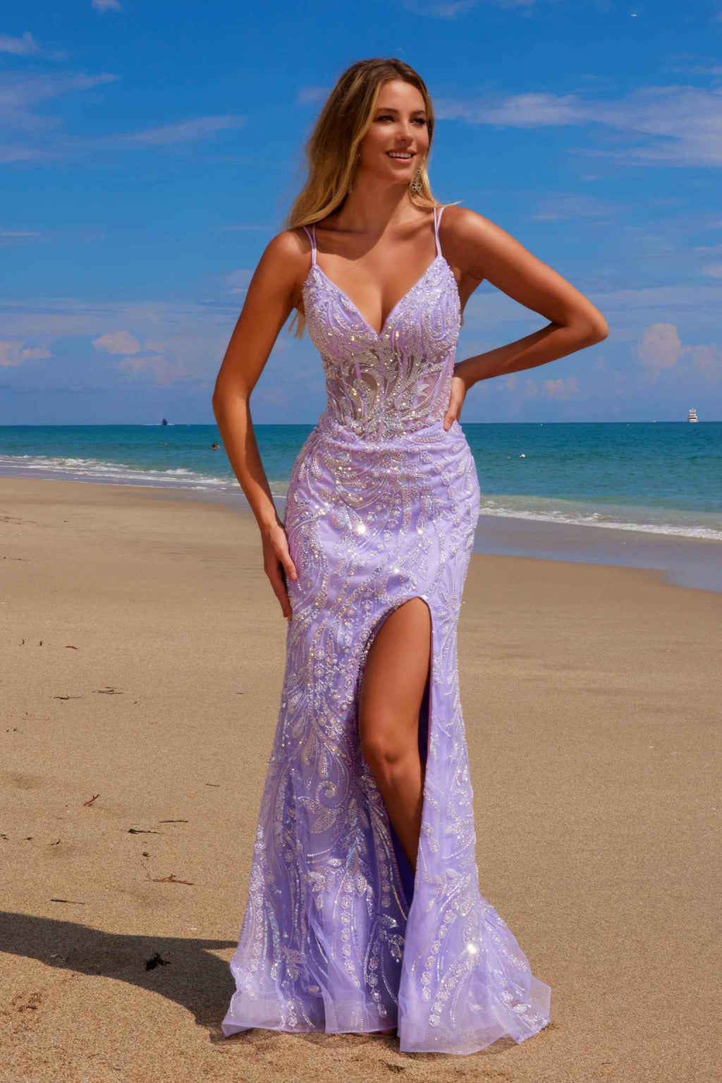 Powder blue fully beaded sweetheart dress with thin straps and thigh-high slit