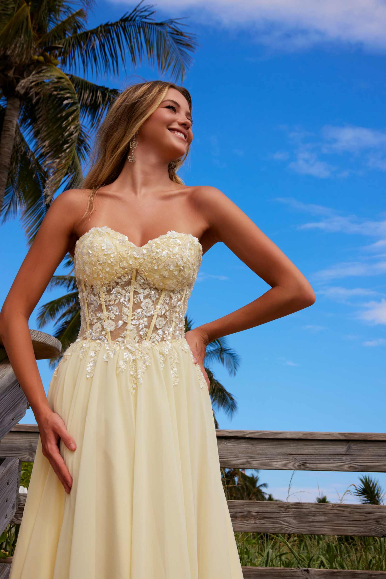 Lemon strapless corset dress with embellished lace bodice and flowing chiffon maxi skirt