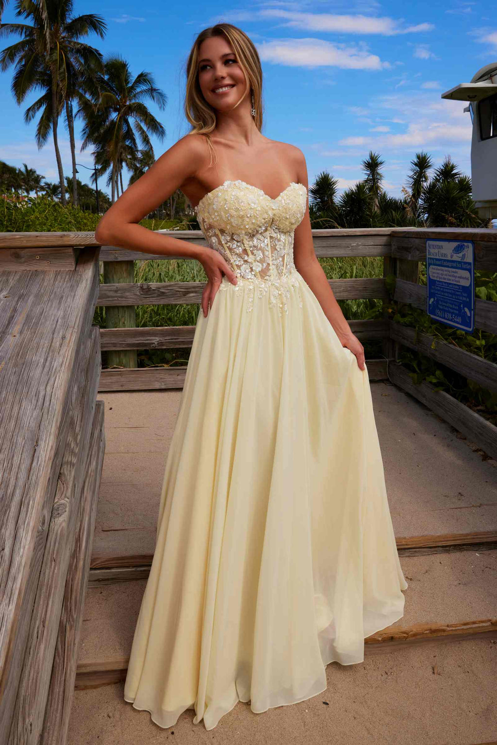 Lemon strapless corset dress with lace applique bodice and flowing chiffon maxi skirt