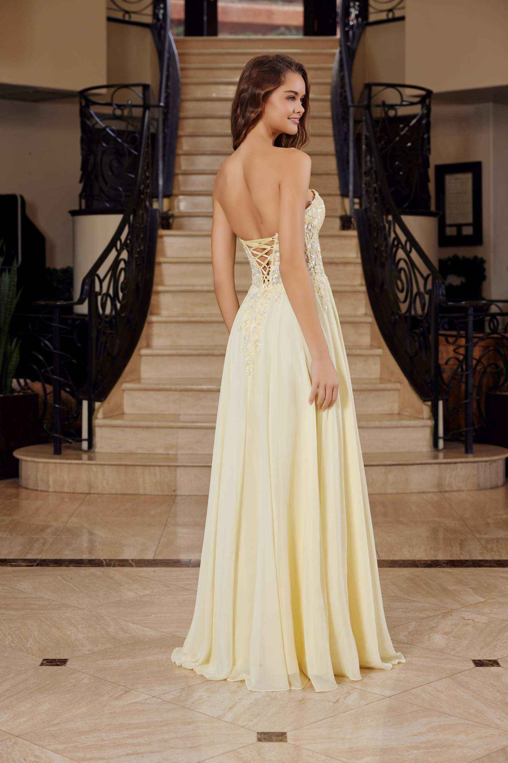Lemon strapless corset dress with lace applique back detail and flowing chiffon maxi skirt