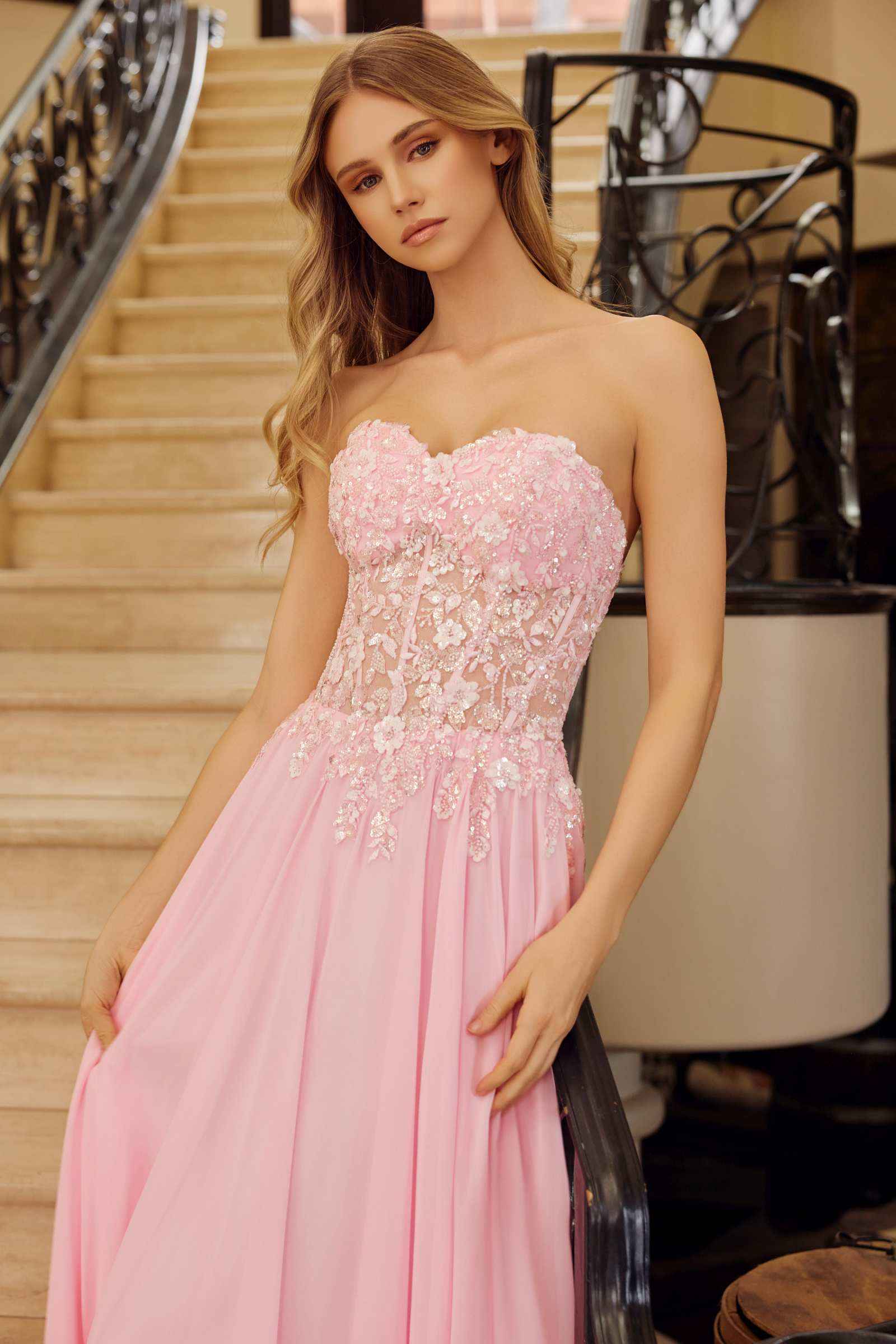 Pink strapless corset dress with beaded applique bodice and chiffon skirt