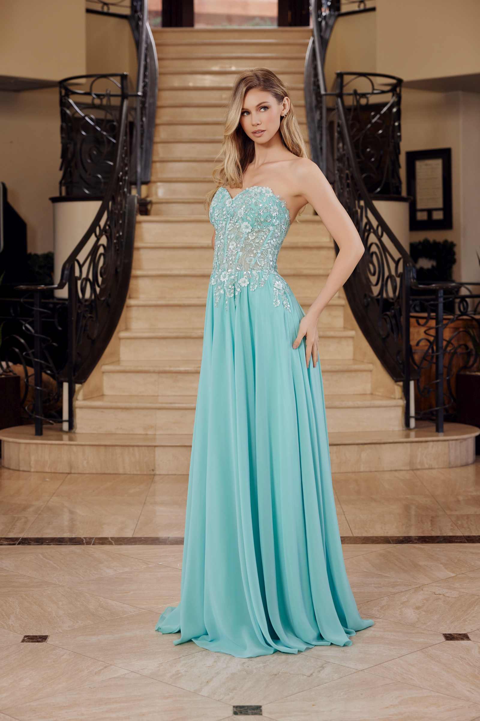Sage green strapless corset dress with lace applique bodice and flowing chiffon maxi skirt, front view