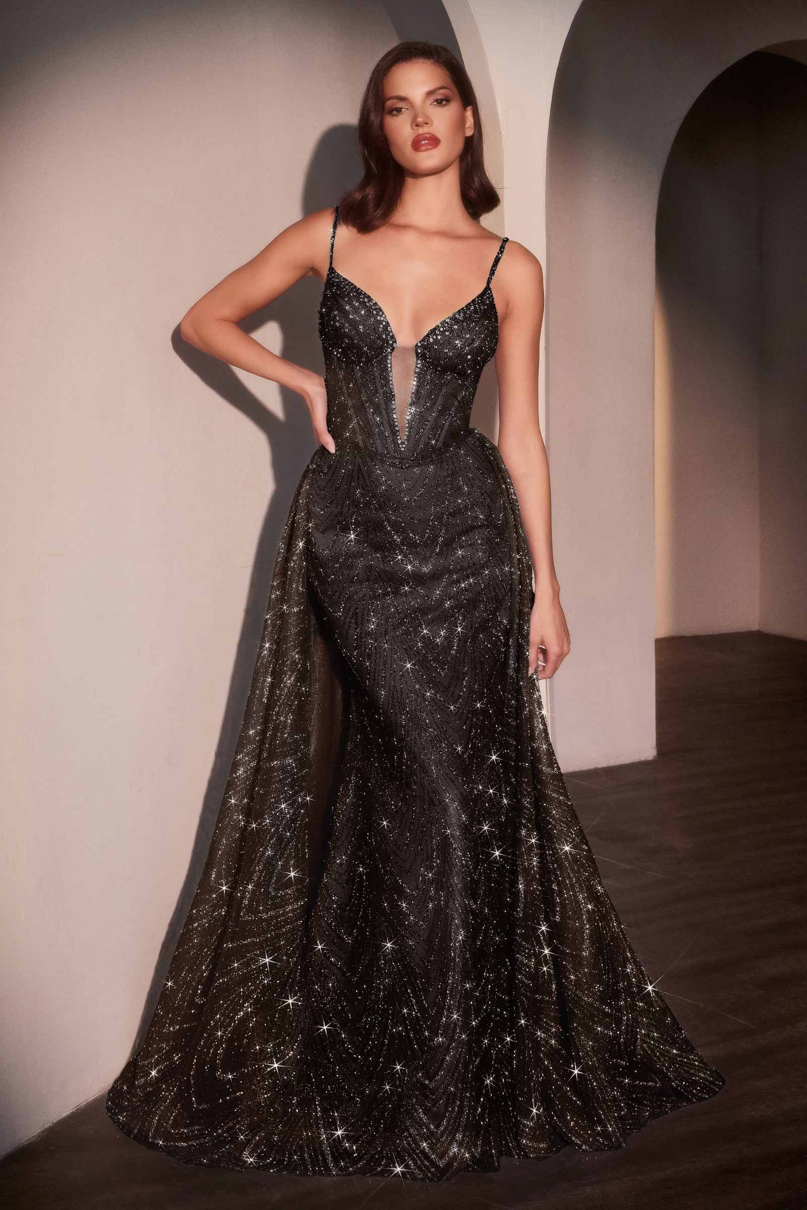 Black glitter V-neck fitted gown with thin straps and flared full skirt