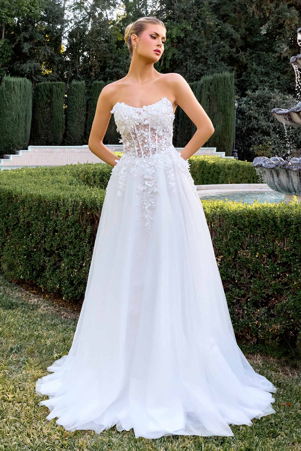 Off-white strapless sweetheart A-line gown with textured floral lace and tulle skirt