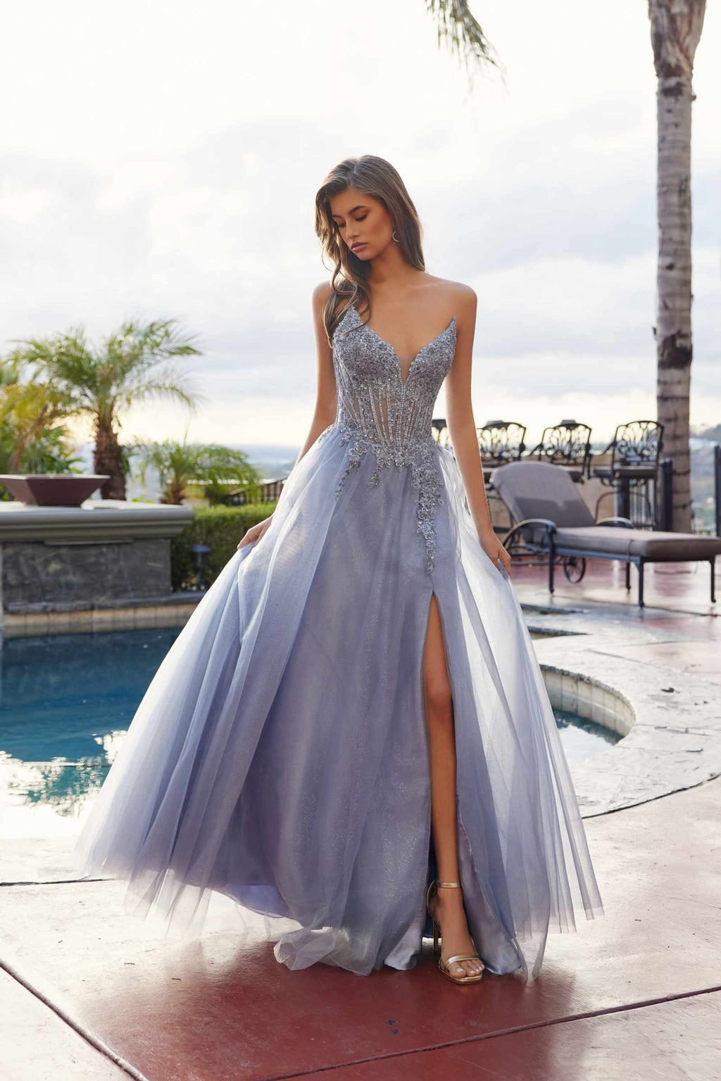 Smoky blue sequin prom ball gown with spaghetti straps, peaked neckline, tulle skirt with slit