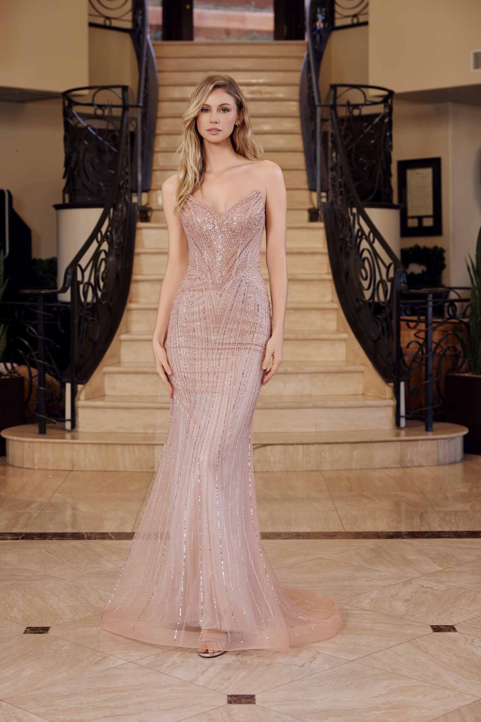 Rosegold strapless beaded tulle prom gown with corset bodice and floor-length mermaid skirt