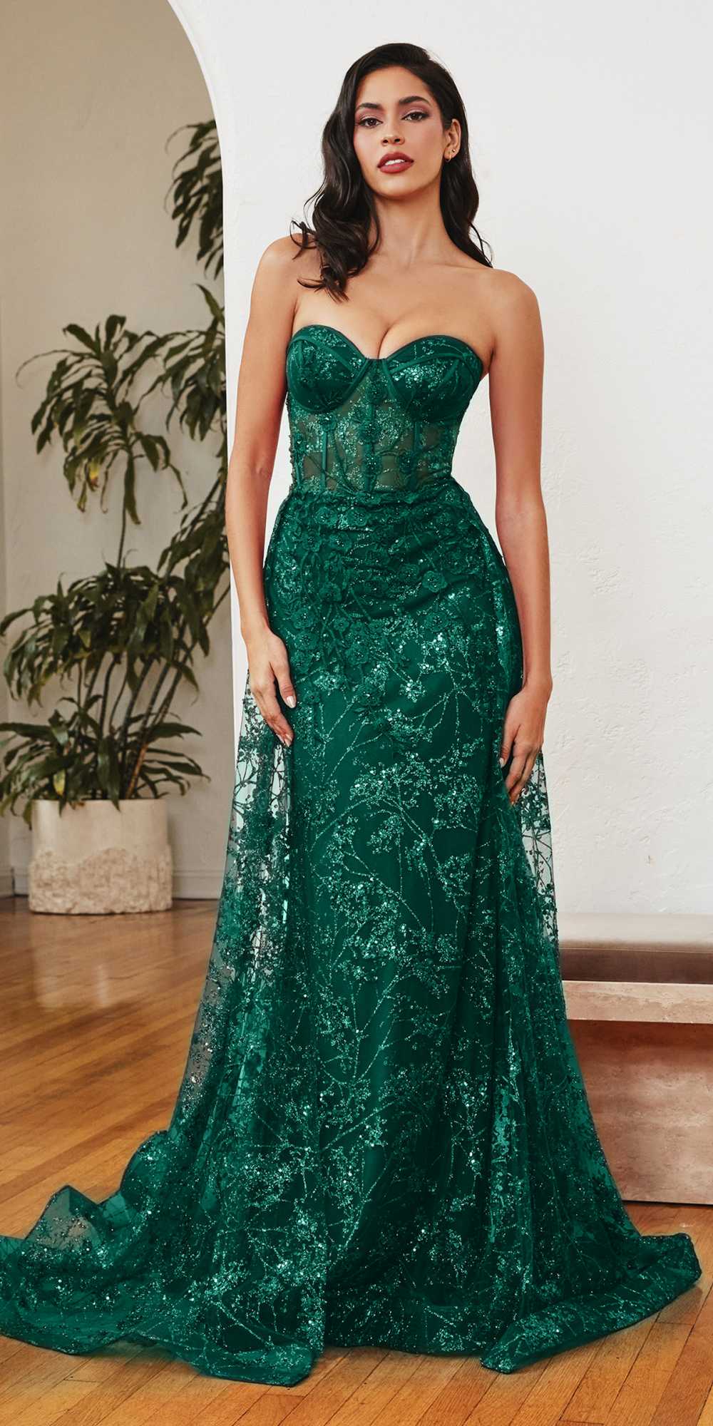 Emerald-green strapless fitted gown with textured glitter fabric and flowing tulle-like skirt