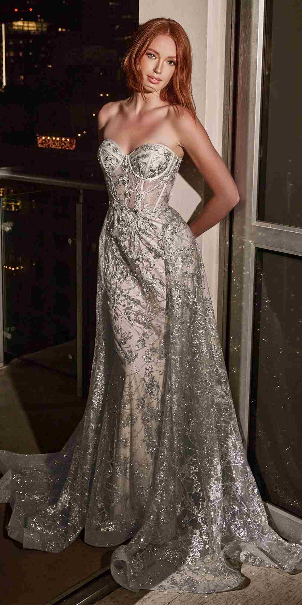 Silver strapless sequin gown with corset-style bodice and full flowing skirt