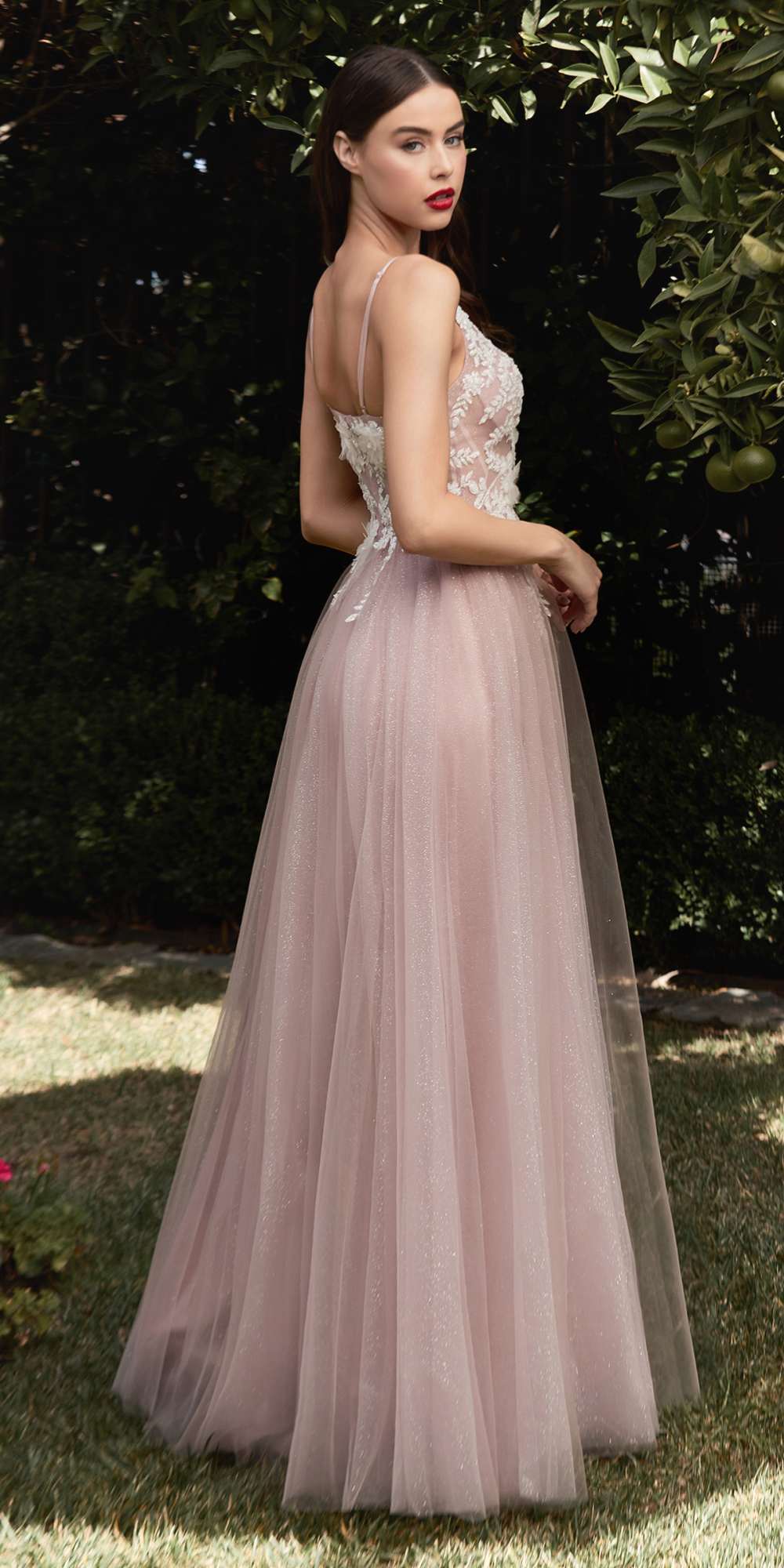 Champagne A-line tulle gown, sleeveless V-neck bodice with floral embroidery, side view.