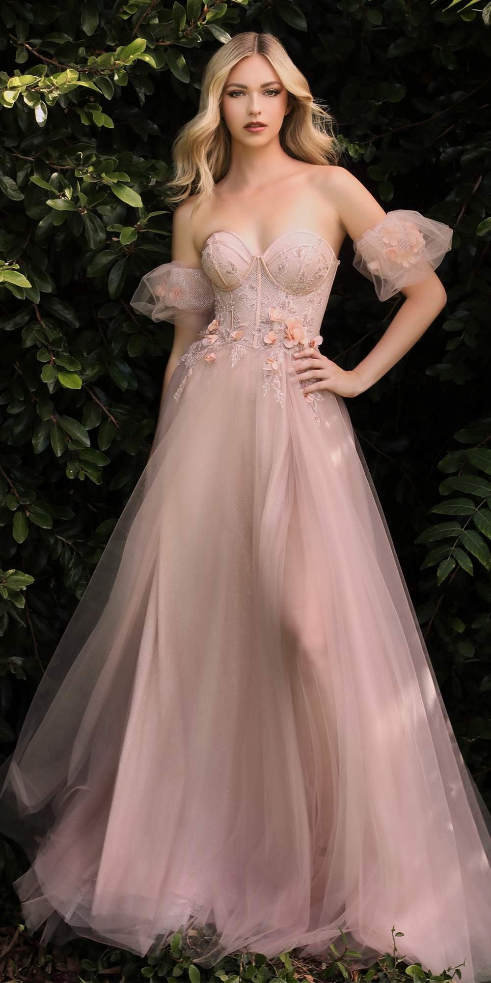 Light pink strapless tulle ball gown with floral lace bodice and puff sleeves
