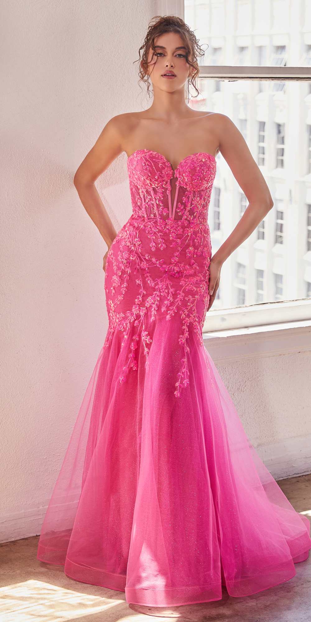 Hot pink strapless mermaid gown with corset bodice and glittering sequins