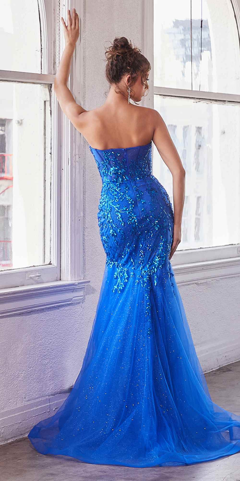 Royal blue strapless mermaid gown with corset bodice and shimmering embellishment