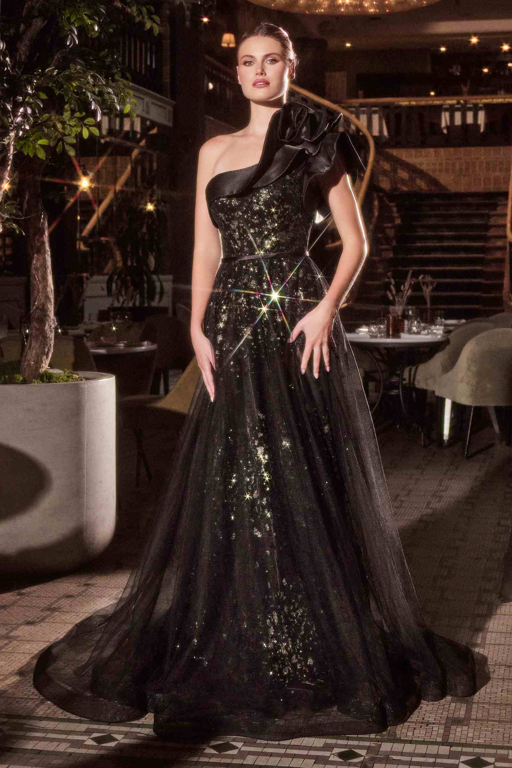 Black one-shoulder ball gown with sparkly sequin bodice and full flowing skirt