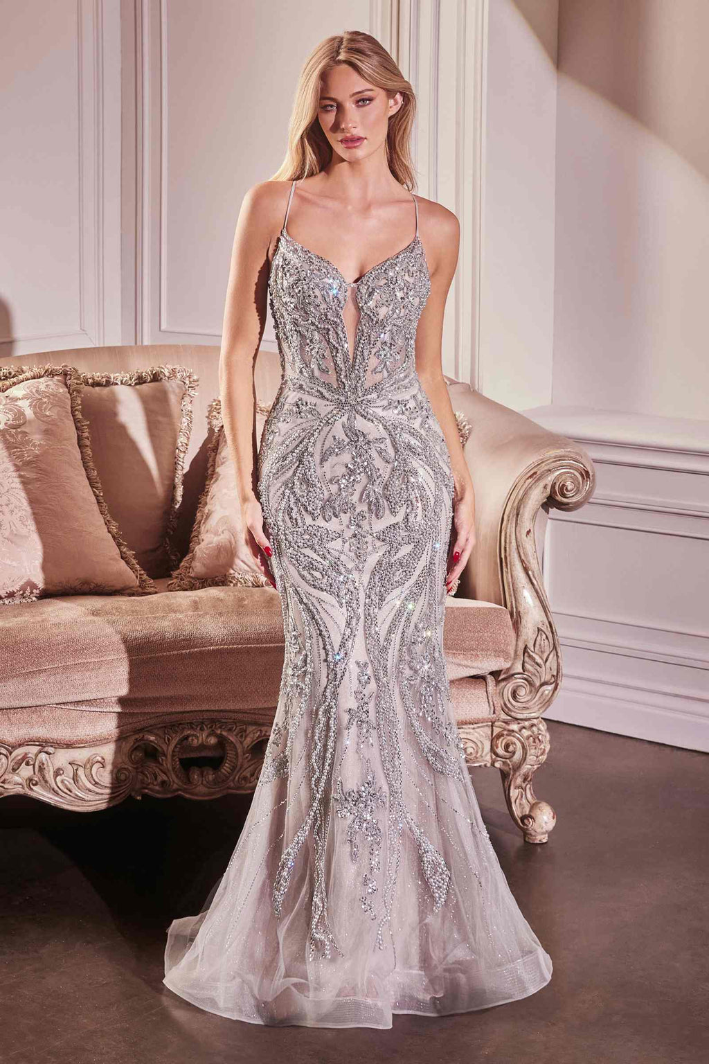Silver pearl-embellished fit-and-flare gown with spaghetti straps and sheer hem