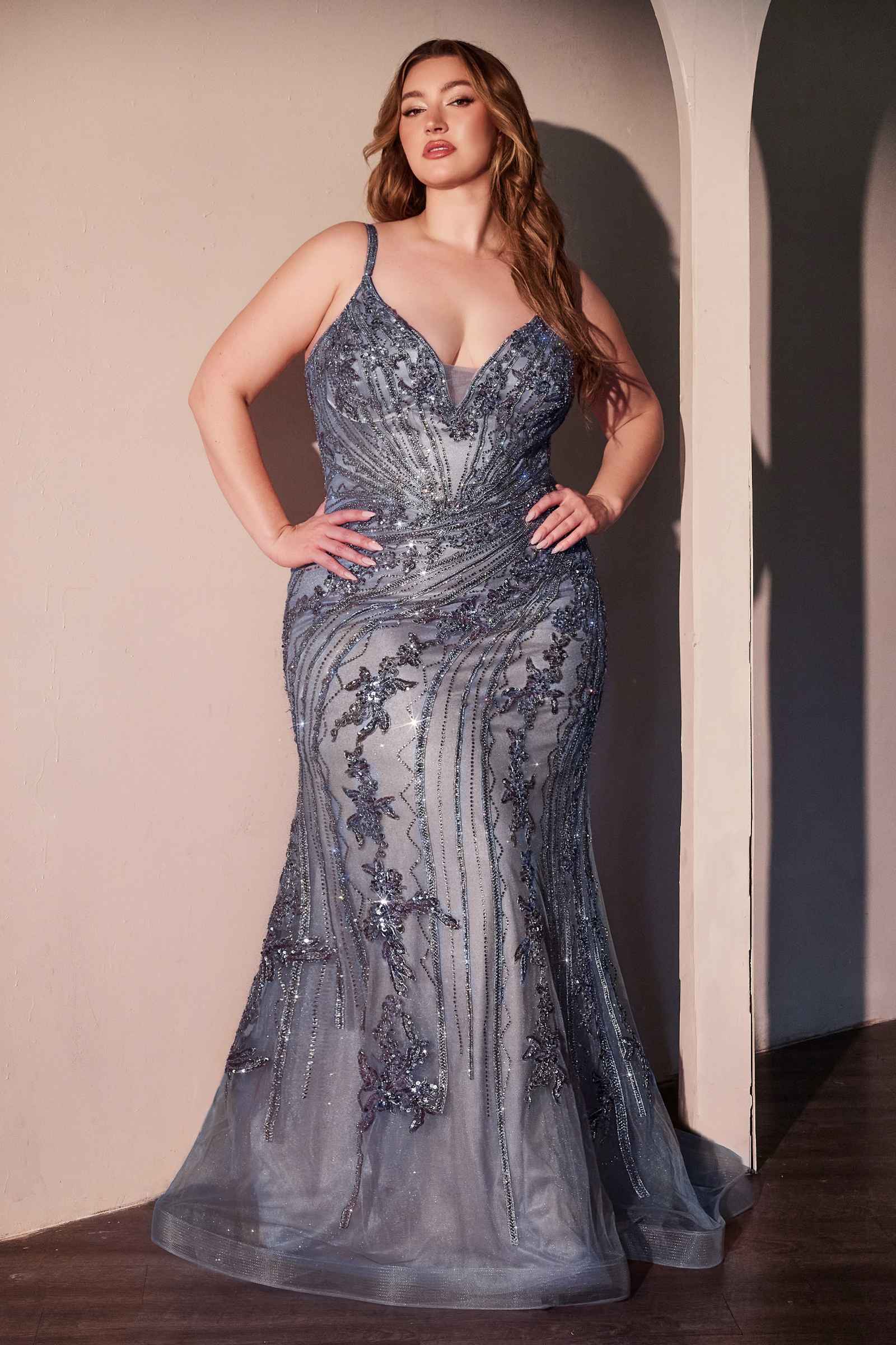 Blue sequined lace fitted gown with V-neck and flowing mermaid hem