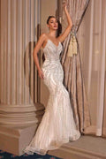 Off-white strapless fitted bridal gown with plunging neckline and beaded sparkle design